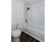 Bright white bathroom with shower and tub combo, featuring modern fixtures and a clean design at 3336 Forrest Hills Dr, Hapeville, GA 30354