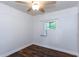 Cozy bedroom features wood floors and a window at 3336 Forrest Hills Dr, Hapeville, GA 30354