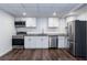 Well-equipped kitchen features stainless steel appliances, granite countertops, and ample cabinet space at 3336 Forrest Hills Dr, Hapeville, GA 30354
