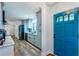 Modern kitchen with gray cabinets, granite countertops, stainless steel appliances, and hardwood floors at 3336 Forrest Hills Dr, Hapeville, GA 30354