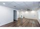 Spacious living area featuring wood-look floors and plenty of natural light at 3336 Forrest Hills Dr, Hapeville, GA 30354