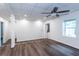 Bright living area with hard surface floors, white walls, and natural light at 3336 Forrest Hills Dr, Hapeville, GA 30354