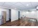 Spacious living area with wood-look flooring, ceiling fan, and recessed lighting at 3336 Forrest Hills Dr, Hapeville, GA 30354