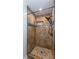 Modern tiled shower with mosaic accent, hand shower, and built-in niche at 3336 Forrest Hills Dr, Hapeville, GA 30354