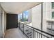 City view from the private outdoor balcony with black metal railings at 620 Peachtree Ne St # 1001, Atlanta, GA 30308