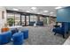 Comfortable lounge area with modern furnishings, plush seating, and access to outdoor patio at 620 Peachtree Ne St # 1001, Atlanta, GA 30308