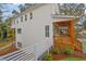 The exterior of this home features a spacious porch and a lovely backyard at 830 Gaston Sw St, Atlanta, GA 30310