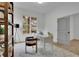 Cozy home office with hardwood floors, neutral decor, and a bookshelf for storage and display at 830 Gaston Sw St, Atlanta, GA 30310
