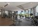 Bright and spacious gym with diverse workout equipment and panoramic views, perfect for fitness enthusiasts at 867 Peachtree Ne St # 702, Atlanta, GA 30308