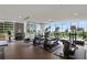 Modern gym featuring state-of-the-art equipment and stunning views from large windows at 867 Peachtree Ne St # 702, Atlanta, GA 30308