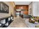 Inviting lobby with brick accent wall, modern reception desk, and stylish decor at 867 Peachtree Ne St # 702, Atlanta, GA 30308