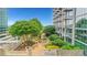 Serene rooftop garden featuring a beautiful fountain, lush landscaping, and scenic views at 867 Peachtree Ne St # 702, Atlanta, GA 30308