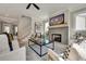 Inviting living room showcasing a fireplace, hardwood floors, and stylish decor at 1679 Eastside Parc St, Atlanta, GA 30316