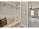 Bright mudroom with custom built-in storage, bench, and hooks, leading to a garage space at 1679 Eastside Parc St, Atlanta, GA 30316
