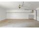 A spacious garage with ample storage shelving, ready for your projects at 1799 Harmony Rd, Powder Springs, GA 30127