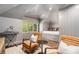 Cozy bedroom featuring a built-in bed, seating area and window with view to the green outdoors at 3089 Marne Nw Dr, Atlanta, GA 30305