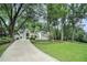 Picturesque traditional-style home with a long driveway and stunning curb appeal at 3089 Marne Nw Dr, Atlanta, GA 30305