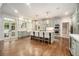 Spacious kitchen with a large island, bar stool seating, and stainless steel appliances at 3089 Marne Nw Dr, Atlanta, GA 30305