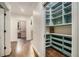 Hallway leading to custom pantry with lots of shelving and storage space at 3089 Marne Nw Dr, Atlanta, GA 30305