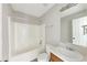 Bathroom featuring a tub with shower, toilet, and vanity at 400 Rustin Dr, Dallas, GA 30157