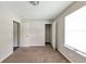 Bedroom with carpet and natural light from the window at 400 Rustin Dr, Dallas, GA 30157