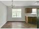 Eat-in kitchen featuring neutral colors and a view of the yard at 400 Rustin Dr, Dallas, GA 30157