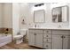 Bright bathroom featuring double vanity, tub, and modern finishes at 800 Old Plank Sq, Duluth, GA 30097
