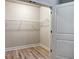 Unfinished closet with wire shelving and ample storage space at 800 Old Plank Sq, Duluth, GA 30097