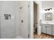 Modern bathroom with a glass-enclosed shower and a niche for toiletries at 800 Old Plank Sq, Duluth, GA 30097