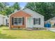 Charming single-story home with brick accent, black shutters, and manicured lawn at 2026 Patterson Park Pl, Lawrenceville, GA 30044