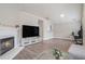 Open living room featuring hardwood floors, a fireplace and vaulted ceilings at 2026 Patterson Park Pl, Lawrenceville, GA 30044