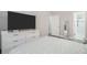 Bright main bedroom with neutral decor and ample closet space at 2026 Patterson Park Pl, Lawrenceville, GA 30044
