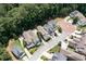 Aerial view of residential community, highlighting well-manicured lawns and mature trees at 2360 Whispering Nw Dr, Kennesaw, GA 30144