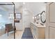 Large bathroom with double sink vanity, ceramic tile floors, and walk in shower at 2360 Whispering Nw Dr, Kennesaw, GA 30144