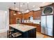 Spacious kitchen with custom cabinets, a large island, and modern stainless steel refrigerator at 2360 Whispering Nw Dr, Kennesaw, GA 30144