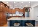 Gourmet kitchen featuring a large island with granite countertops, pendant lighting, and stainless steel appliances at 2360 Whispering Nw Dr, Kennesaw, GA 30144