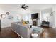 Open living area with a fireplace, comfortable seating, and stylish decor at 2360 Whispering Nw Dr, Kennesaw, GA 30144