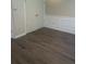 Living area with chair rail moulding and wood flooring at 2550 Presidents Walk, Tucker, GA 30084
