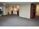 Finished basement featuring a kitchenette with cabinets, sink, and a wine cooler at 4098 Nancy Creek Ne Way, Brookhaven, GA 30319