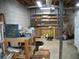 Unfinished basement with concrete block walls and exposed wood beams and duct work at 4098 Nancy Creek Ne Way, Brookhaven, GA 30319