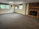 Spacious basement featuring a fireplace and windows with lots of natural light at 4098 Nancy Creek Ne Way, Brookhaven, GA 30319