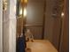 Bathroom with a sink, shower, and neutral tiled walls at 4098 Nancy Creek Ne Way, Brookhaven, GA 30319