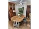 Dining room features a wooden table with chairs, a built-in cabinet, and a decorative wall design at 4098 Nancy Creek Ne Way, Brookhaven, GA 30319