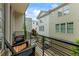 Relaxing balcony view showcasing outdoor seating and the surrounding neighborhood's architectural charm at 658 Bull Se St, Atlanta, GA 30315