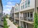 Modern townhome exteriors feature balconies and meticulous landscaping, creating a welcoming neighborhood feel at 658 Bull Se St, Atlanta, GA 30315