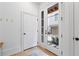 Entrance foyer with coat closet, door to garage, and view of the backyard at 658 Bull Se St, Atlanta, GA 30315