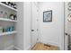 Hallway with white shelves and a view of an adjacent bathroom at 658 Bull Se St, Atlanta, GA 30315