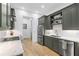 An open-concept kitchen design with stainless steel appliances and white countertops at 658 Bull Se St, Atlanta, GA 30315