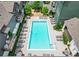 Aerial view of a community swimming pool with lounge chairs and landscaping surrounding apartment complex at 658 Bull Se St, Atlanta, GA 30315