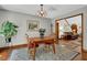 Bright dining room with hardwood floors, decorative lighting, and easy access to other living areas at 680 Spirit Falls Way, Johns Creek, GA 30022